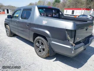 2009 Honda Ridgeline RTL with VIN 2HJYK16539H503533, listed as a IAAI auction lot 42040423 with 206,102 mi miles. Bid and sale history available at carsss.com. Image 3.