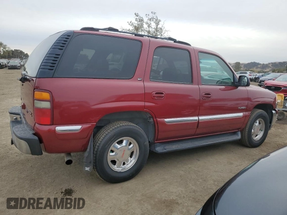 2001 GMC Yukon SLT z VIN 1GKEC13T21J302687, wystawiony jako Copart lot #80982344 z przebiegiem 139 565 mil mil oraz Szkoda całkowita • Salvage title. Historia ofert i sprzedaży dostępna na DreamBid. Obrazek 3.