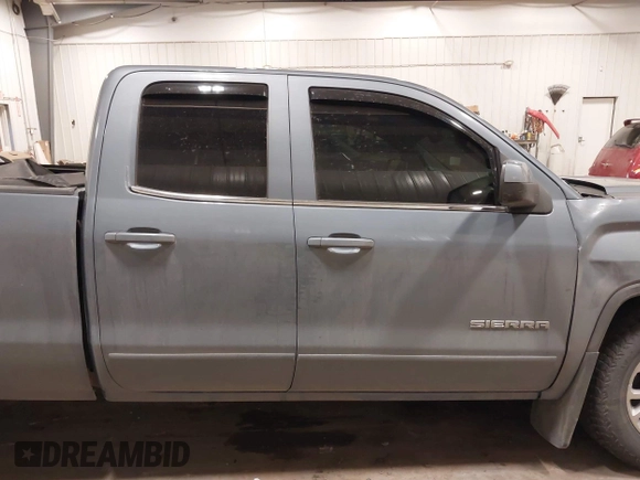 2015 GMC Sierra 1500 SLE z VIN 1GTV2UECXFZ285403, wystawiony jako IAAI lot #41255076 z przebiegiem 71 498 mil mil oraz . Historia ofert i sprzedaży dostępna na DreamBid. Obrazek 14.