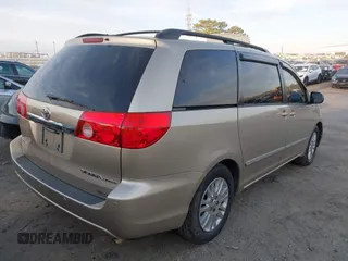 2007 Toyota Sienna XLE with VIN 5TDZK22C97S062721, listed as a IAAI auction lot 41900786 with 220,189 mi miles. Bid and sale history available at carsss.com. Image 4.