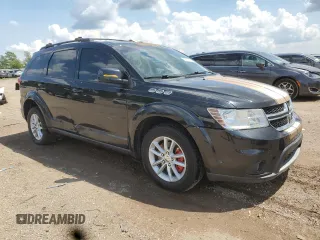 2013 Dodge Journey SXT with VIN 3C4PDCBG9DT619557, listed as a Copart auction lot 61551545 with 159,950 mi miles and Salvage title. Bid and sale history available at DreamBid. Image 4.