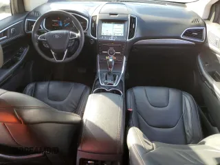 2016 Ford Edge Titanium with VIN 2FMPK4K92GBB43743, listed as a Copart auction lot 82687633 with 151,311 mi miles and Salvage Title. Bid and sale history available at carsss.com. Image 8.