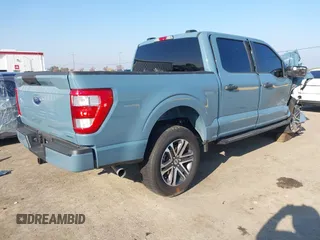 2023 Ford F-150 XL with VIN 1FTEW1EP4PKF58559, listed as a IAAI auction lot 40953057 with 7,900 mi miles. Bid and sale history available at carsss.com. Image 4.