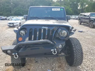 2011 Jeep Wrangler Unlimited Rubicon с VIN 1J4BA6H17BL634200, выставлен на аукционе Copart как лот 56154275 с пробегом 146 500 миль миль и Списание • Salvage title. История ставок и продаж доступна на DreamBid. Изображение 5.