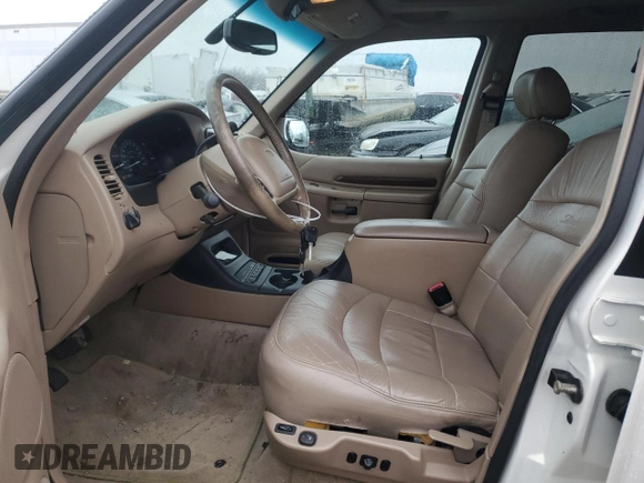 1999 Ford Explorer XLT z VIN 1FMDU35P0XZB93331, wystawiony jako Copart lot #89057375 z przebiegiem 94 699 mil mil oraz Szkoda całkowita • Salvage title. Historia ofert i sprzedaży dostępna na DreamBid. Obrazek 7.