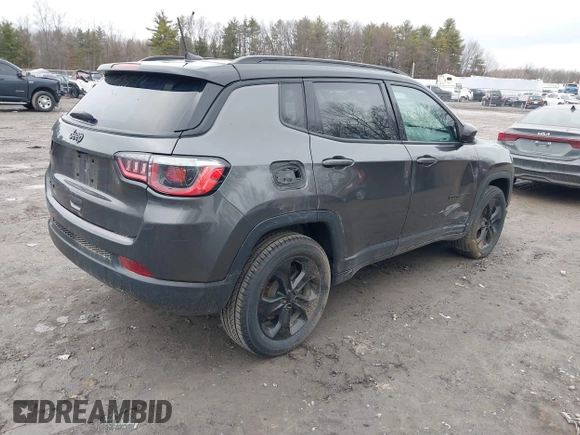 2020 Jeep Compass Latitude with VIN 3C4NJDBB5LT209864, listed as a IAAI auction lot 41793397 with 95,018 mi miles and . Bid and sale history available at DreamBid. Image 4.
