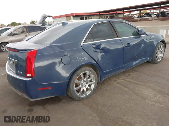 2009 Cadillac CTS RWD w/1SB with VIN 1G6DV57V690111847, listed as a IAAI auction lot 42189418 with 144,790 mi miles. Bid and sale history available at carsss.com. Image 4.
