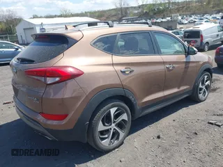 2016 Hyundai Tucson Eco with VIN KM8J3CA26GU207956, listed as a IAAI auction lot 42093540 with 87,380 mi miles. Bid and sale history available at carsss.com. Image 4.