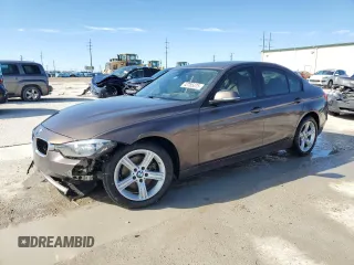 2015 BMW 3 Series 328i with VIN WBA3A5G58FNS88853, listed as a Copart auction lot 42785375 with 129,918 mi miles and Salvage title. Bid and sale history available at DreamBid. Image 1.