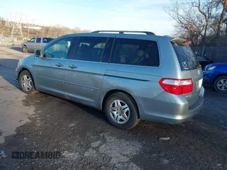 2007 Honda Odyssey EX-L z VIN 5FNRL387X7B081408, wystawiony jako IAAI lot #41143045 z przebiegiem 201 248 mil mil oraz . Historia ofert i sprzedaży dostępna na DreamBid. Obrazek 3.