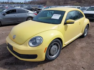 2012 Volkswagen Beetle 2.5L PZEV with VIN 3VWJP7AT3CM659061, listed as a IAAI auction lot 41935151 with 101,339 mi miles. Bid and sale history available at carsss.com. Image 2.