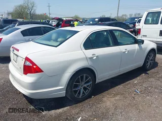 2011 Ford Fusion S with VIN 3FAHP0GA5BR226931, listed as a IAAI auction lot 42035608 with 227,315 mi miles. Bid and sale history available at carsss.com. Image 4.