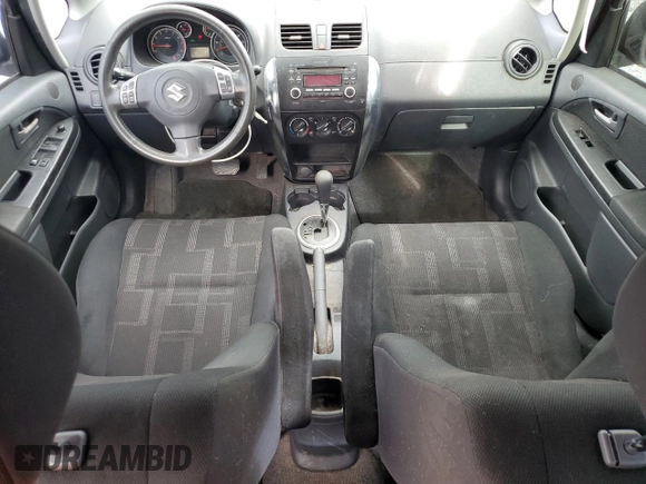 2012 Suzuki SX4 LE with VIN JS2YC5A39C6300577, listed as a Copart auction lot 86998944 with 103,354 mi miles and Non Repairable. Bid and sale history available at carsss.com. Image 8.