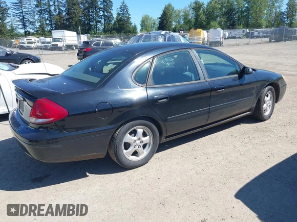2005 Ford Taurus SE with VIN 1FAFP53255A228082, listed as a IAAI auction lot 42183671 with 95,382 mi miles and . Bid and sale history available at DreamBid. Image 4.
