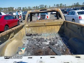 2014 Chevrolet Silverado 1500 Work Truck with VIN 1GCNCPEH0EZ272958, listed as a IAAI auction lot 41801400 with 130,363 mi miles and . Bid and sale history available at DreamBid. Image 8.
