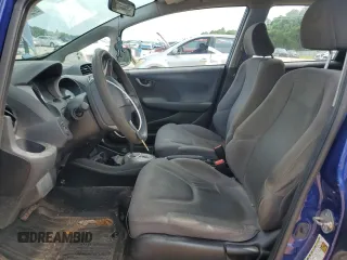 2009 Honda Fit with VIN JHMGE882X9S007865, listed as a Copart auction lot 61025875 with 159,919 mi miles and Clean title. Bid and sale history available at DreamBid. Image 7.