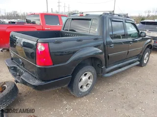 2004 Ford Explorer Sport Trac XLS with VIN 1FMZU77K64UB43072, listed as a IAAI auction lot 41555127 with 175,269 mi miles. Bid and sale history available at carsss.com. Image 4.