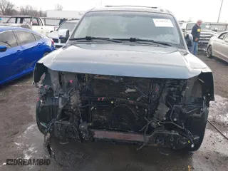 2015 Nissan Armada SV with VIN 5N1BA0ND5FN601574, listed as a IAAI auction lot 41240197 with 180,008 mi miles. Bid and sale history available at carsss.com. Image 6.