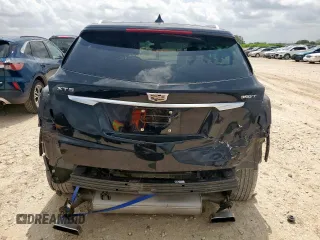 2021 Cadillac XT5 FWD Luxury with VIN 1GYKNAR42MZ120996, listed as a Copart auction lot 63314655 with 49,977 mi miles and Salvage title. Bid and sale history available at DreamBid. Image 6.