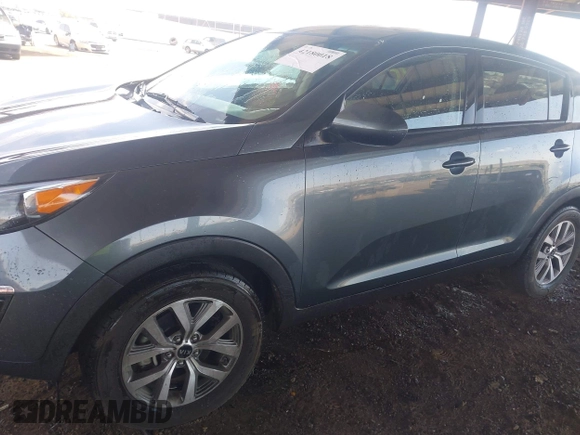 2014 Kia Sportage LX with VIN KNDPB3ACXE7588801, listed as a IAAI auction lot 42180018 with 192,062 mi miles and . Bid and sale history available at carsss.com. Image 13.