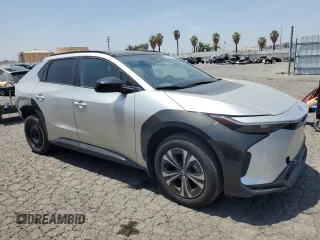 2024 Toyota bZ4X XLE with VIN JTMAAAAA1RA044367, listed as a Copart auction lot 59583075 with 10,890 mi miles and Salvage title. Bid and sale history available at DreamBid. Image 4.