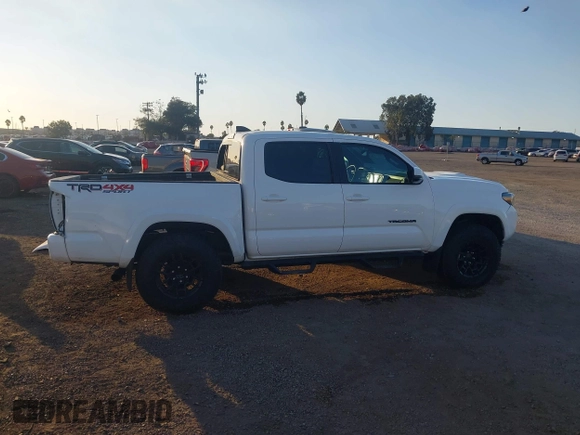 2023 Toyota Tacoma 4WD SR with VIN 3TMCZ5AN8PM647845, listed as a IAAI auction lot 41371634 with 21,917 mi miles. Bid and sale history available at carsss.com. Image 14.