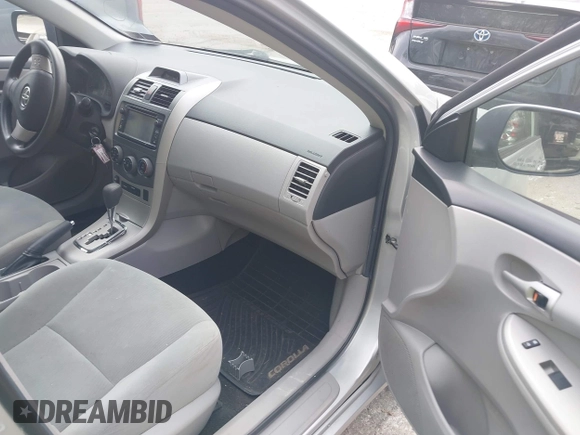 2013 Toyota Corolla L with VIN 2T1BU4EEXDC052854, listed as a IAAI auction lot 42230118 with 156,120 mi miles and . Bid and sale history available at DreamBid. Image 5.