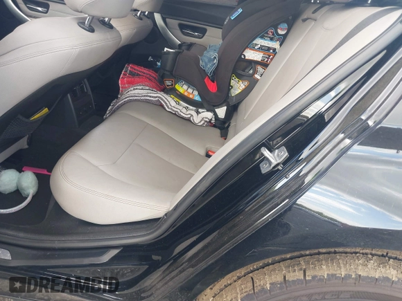 2013 BMW 3 Series 335i xDrive with VIN WBA3B9G54DNR89987, listed as a IAAI auction lot 42159592 with 165,999 mi miles and . Bid and sale history available at DreamBid. Image 8.