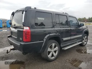 2010 Jeep Commander Limited with VIN 1J4RG5GT4AC146847, listed as a Copart auction lot 50259965 with 114,894 mi miles and Salvage title. Bid and sale history available at DreamBid. Image 3.