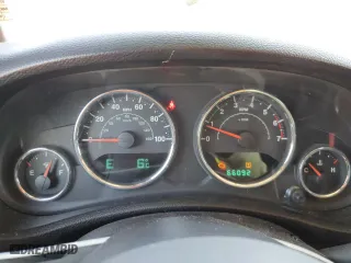 2011 Jeep Wrangler Unlimited Sahara with VIN 1J4HA5H13BL561993, listed as a Copart auction lot 52174355 with 66,092 mi miles and Salvage Title. Bid and sale history available at carsss.com. Image 9.