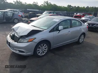 2012 Honda Civic EX with VIN 19XFB2F81CE098044, listed as a IAAI auction lot 42064121 with 147,628 mi miles and . Bid and sale history available at DreamBid. Image 2.