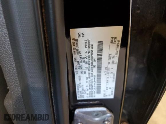 2016 Ford Escape Titanium with VIN 1FMCU0J91GUB09161, listed as a Copart auction lot 50027315 with 106,784 mi miles and Salvage Title. Bid and sale history available at carsss.com. Image 14.