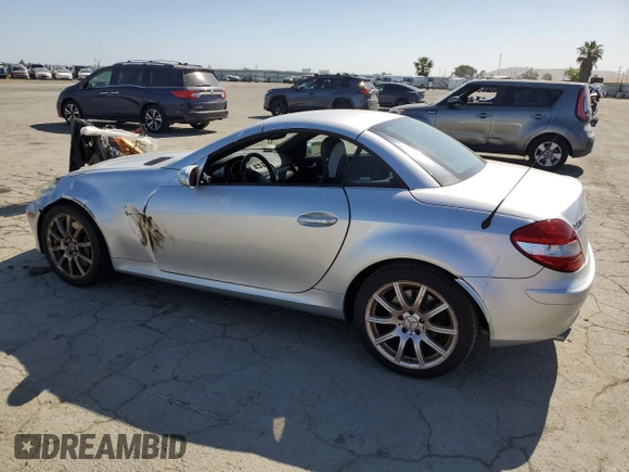 2005 Mercedes-Benz SLK 230/320 with VIN WDBWK56F05F043625, listed as a Copart auction lot 55623625 with 170,798 mi miles and Salvage title. Bid and sale history available at DreamBid. Image 2.