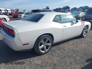 2014 Dodge Challenger R/T with VIN 2C3CDYBT6EH185590, listed as a IAAI auction lot 42536813 with 198,854 mi miles and . Bid and sale history available at DreamBid. Image 4.
