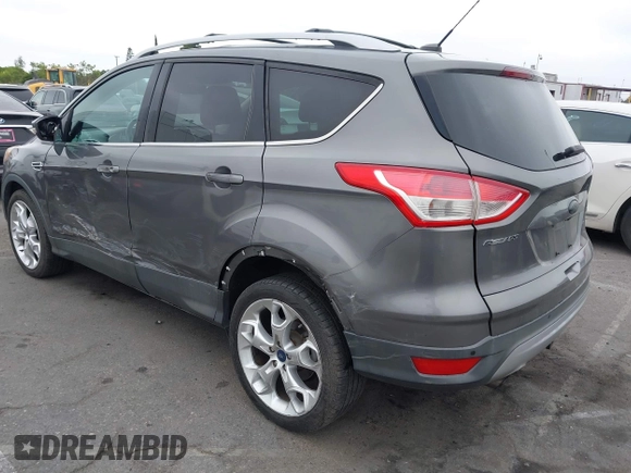 2013 Ford Escape Titanium with VIN 1FMCU0J9XDUD86354, listed as a IAAI auction lot 42420780 with 260,995 mi miles and . Bid and sale history available at DreamBid. Image 3.