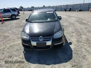 2009 Volkswagen Jetta SE with VIN 3VWRZ71K39M139505, listed as a Copart auction lot 57687645 with 217,149 mi miles and Salvage title. Bid and sale history available at DreamBid. Image 13.
