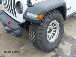 2021 Jeep Wrangler Unlimited Rubicon with VIN 1C4HJXFG7MW527498, listed as a IAAI auction lot 42393520 with 18,085 mi miles and . Bid and sale history available at DreamBid. Image 6.