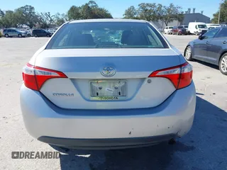 2014 Toyota Corolla L with VIN 2T1BURHE5EC006925, listed as a IAAI auction lot 40917569 with 130,761 mi miles and . Bid and sale history available at DreamBid. Image 16.
