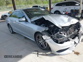 2016 Mercedes-Benz E 400 with VIN WDDKJ6HB6GF328700, listed as a IAAI auction lot 42157340 with 125,183 mi miles and . Bid and sale history available at DreamBid. Image 1.