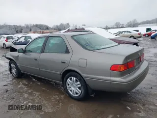 2001 Toyota Camry CE with VIN 4T1BG22K11U036462, listed as a IAAI auction lot 41606683 with 217,077 mi miles and . Bid and sale history available at DreamBid. Image 3.