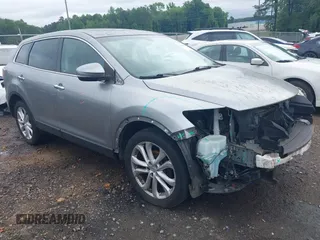 2011 Mazda CX-9 Grand Touring z VIN JM3TB2DA1B0304941, wystawiony jako IAAI lot #42239565 z przebiegiem 157 324 mil mil oraz . Historia ofert i sprzedaży dostępna na DreamBid. Obrazek 1.