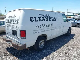2000 Ford Econoline Cargo with VIN 1FTRE1428YHB75166, listed as a IAAI auction lot 42169852 with 297,756 mi miles. Bid and sale history available at carsss.com. Image 4.