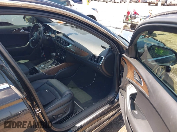 2014 Audi A6 Prestige with VIN WAUHGAFC9EN027338, listed as a IAAI auction lot 42377190 with 164,427 mi miles and . Bid and sale history available at DreamBid. Image 5.