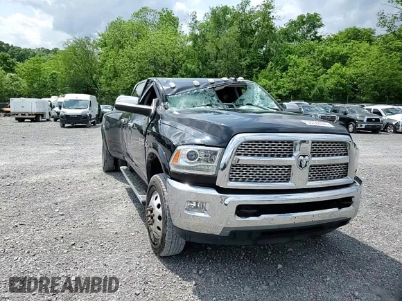 2018 Ram 3500 Laramie z VIN 3C63RRJL0JG320889, wystawiony jako Copart lot #56722505 z przebiegiem 213 976 mil mil oraz Szkoda całkowita • Salvage title. Historia ofert i sprzedaży dostępna na DreamBid. Obrazek 13.