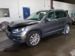 2013 Volkswagen Tiguan SEL z VIN WVGBV7AX5DW017728, wystawiony jako Copart lot #58242735 z przebiegiem 143 552 mil mil oraz Szkoda całkowita • Salvage title. Historia ofert i sprzedaży dostępna na DreamBid. Obrazek 1.