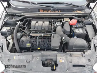 2013 Ford Taurus SEL with VIN 1FAHP2E86DG135835, listed as a IAAI auction lot 41665430 with 130,816 mi miles. Bid and sale history available at carsss.com. Image 10.