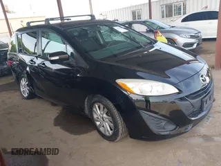 2015 Mazda 5 Sport with VIN JM1CW2BL2F0184901, listed as a IAAI auction lot 42116351 with 260,931 mi miles. Bid and sale history available at carsss.com. Image 1.