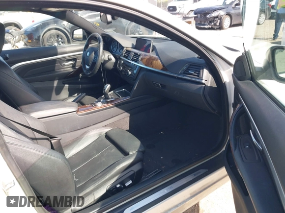 2016 BMW 4 Series 428i with VIN WBA3N7C57GK227468, listed as a IAAI auction lot 41188647 with 81,115 mi miles and . Bid and sale history available at carsss.com. Image 5.