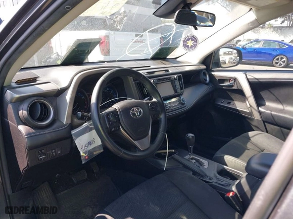 2018 Toyota RAV4 XLE with VIN 2T3WFREVXJW463701, listed as a IAAI auction lot 41599033 with 91,860 mi miles. Bid and sale history available at carsss.com. Image 18.