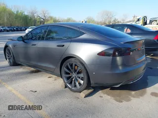 2016 Tesla Model S 90D with VIN 5YJSA1E43GF115310, listed as a IAAI auction lot 42002240 with 108,172 mi miles and . Bid and sale history available at DreamBid. Image 3.